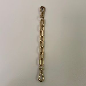 Bandolier discontinued chunky gold chain wristlet